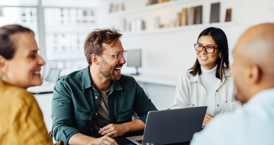 Diverse business people having a team meeting in an office